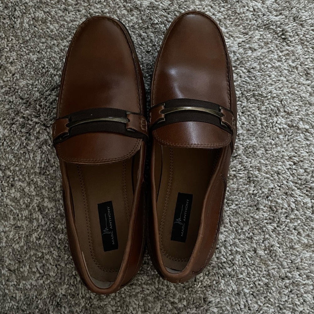 Brand new, never been worn Marc Anthony dress shoes. Size 10.